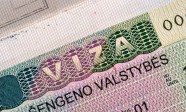 56556972 - schengen visa in passport
